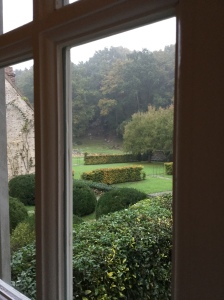 Looking out the kitchen window to the formal gardens at Le Moulin.